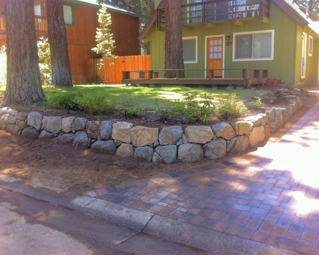 Natural Rock Retaining Wall Planter with Paver Driveway - Earth &amp; Stone Landscapes