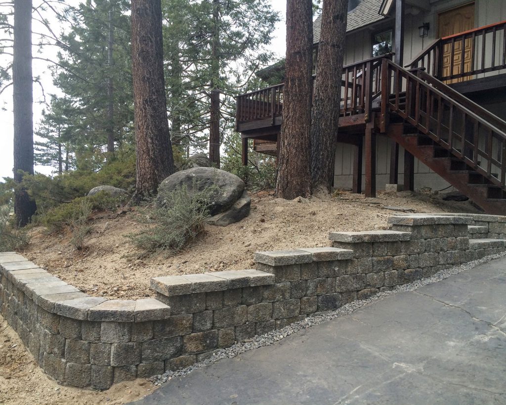 Stepped Retaining Wall next to driveway by Earth &amp; Stone Landscapes for Tahoe and surrounding areas