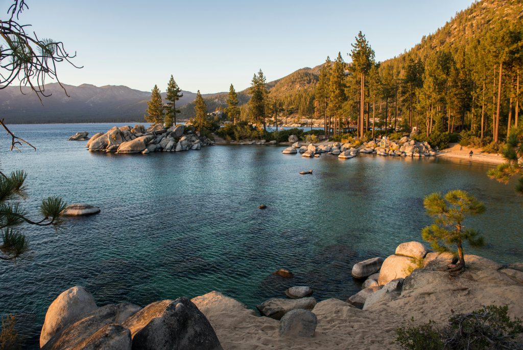 pexels-photo-12777595-12777595 Lake tahoe east shore with a forested beach and rocky shore